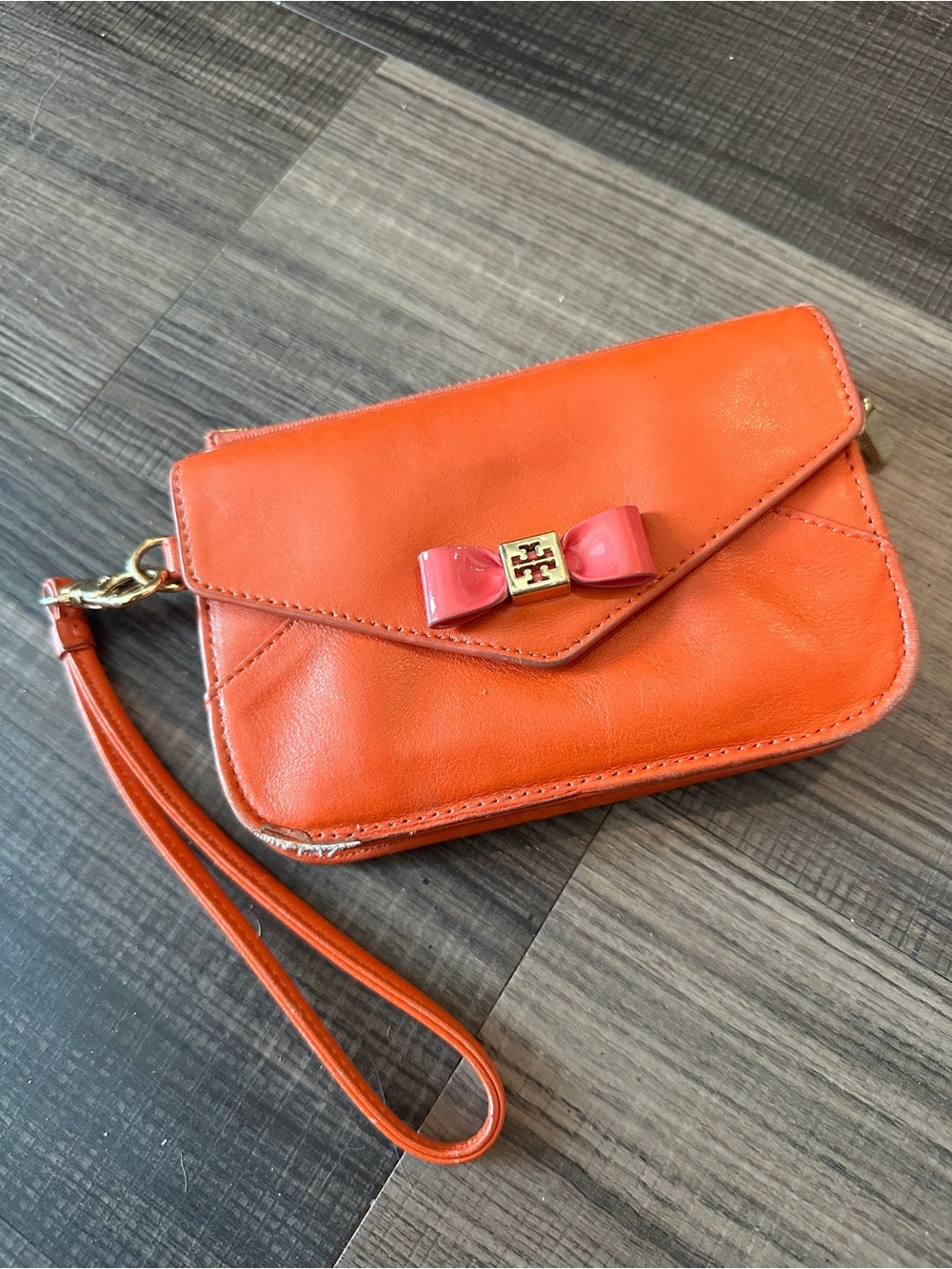 Tory Burch Leather Wristlet Wallet – Orange with Pink Bow Accent